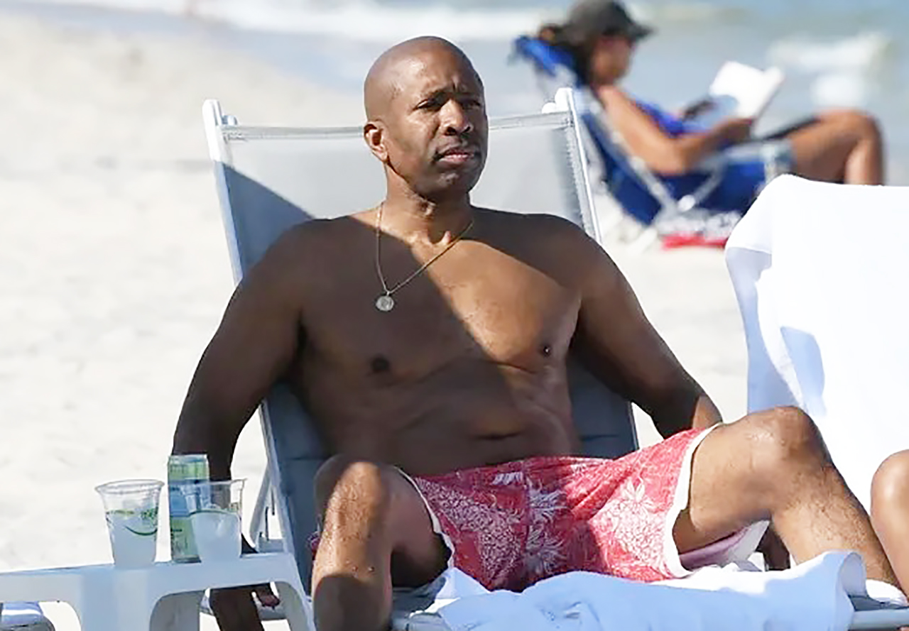 Kenny Smith caught on the beach with hottie