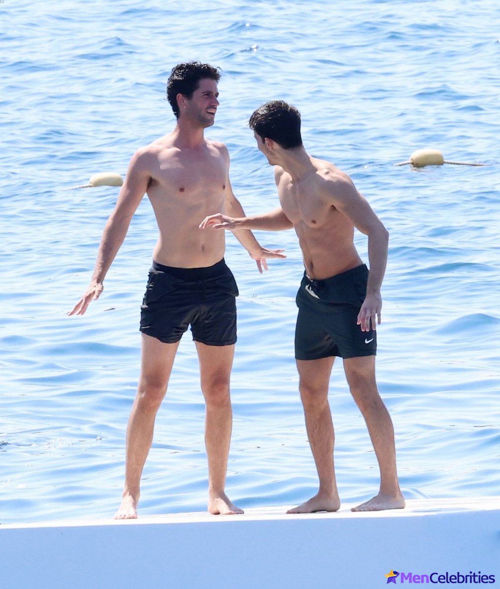 Manu Rios half-naked on the beach in Cannes