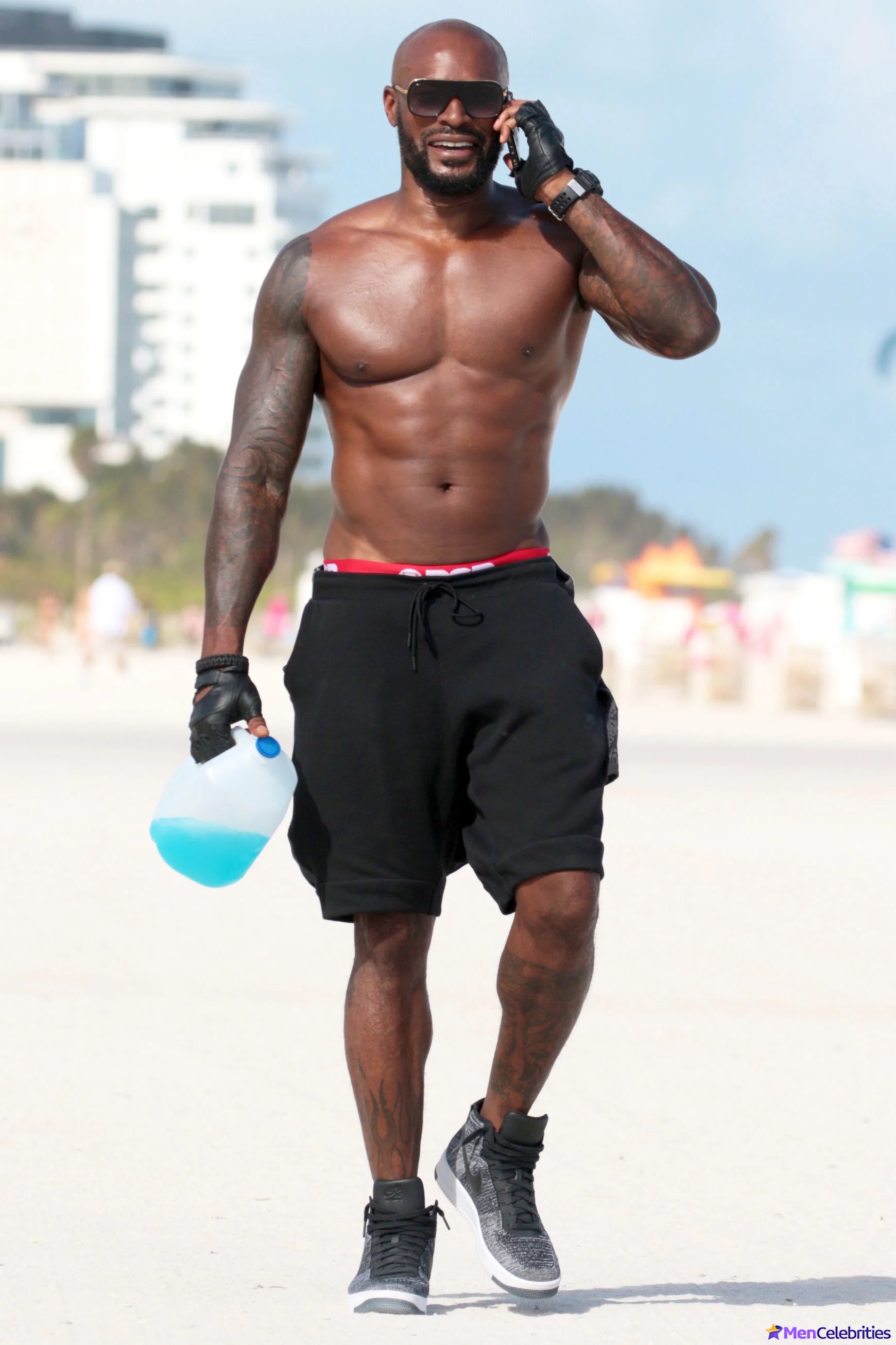 Tyson Beckford Shirtless and Shows Off Toned Abs
