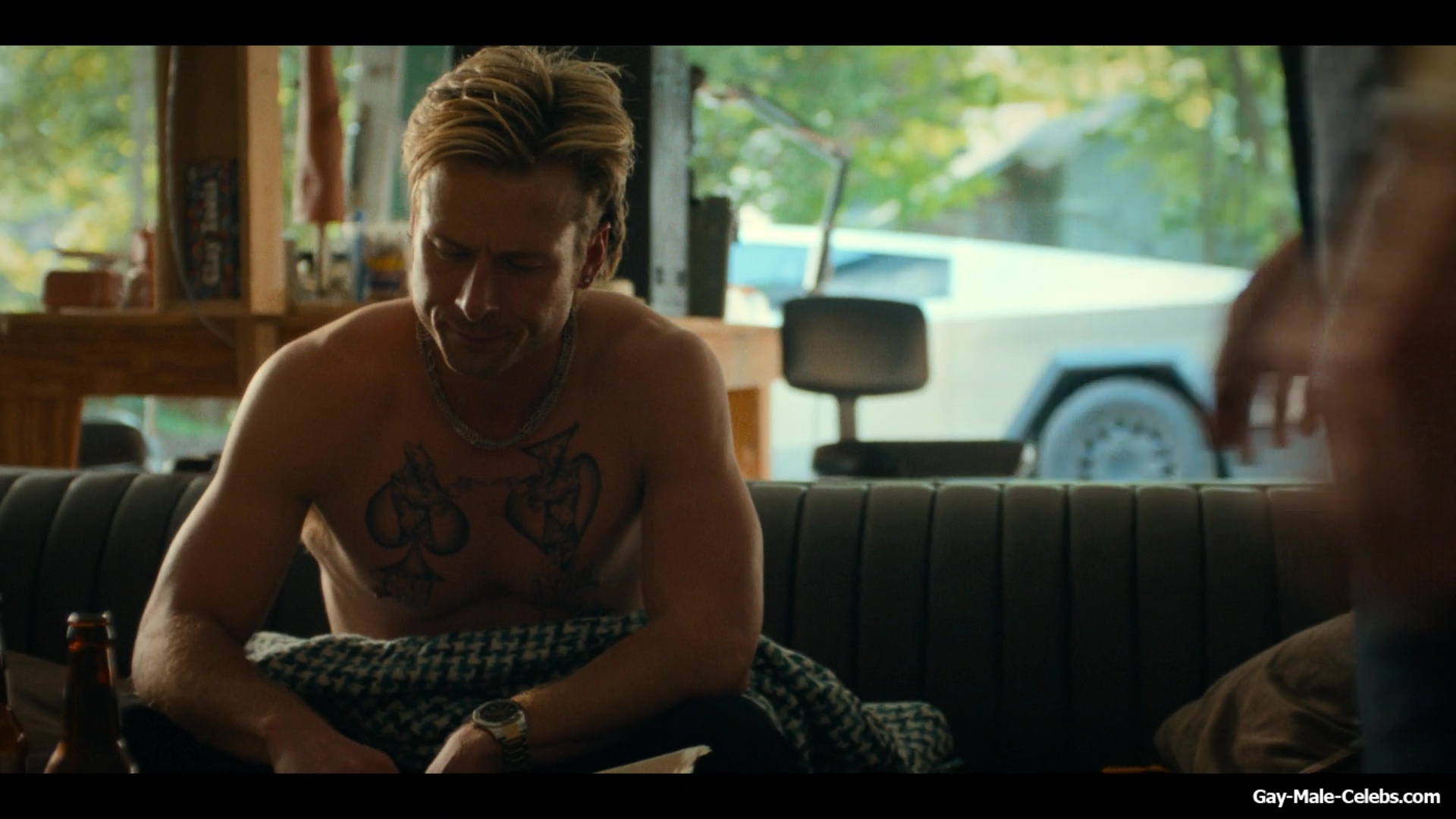 Glen Powell shirtless in Chad Powers