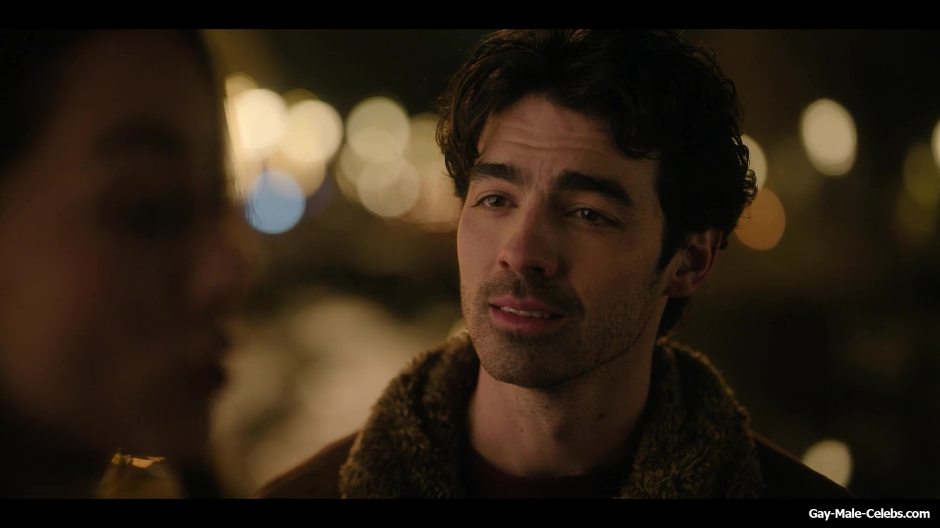 Joe Jonas shirtless in A Very Jonas Christmas Movie