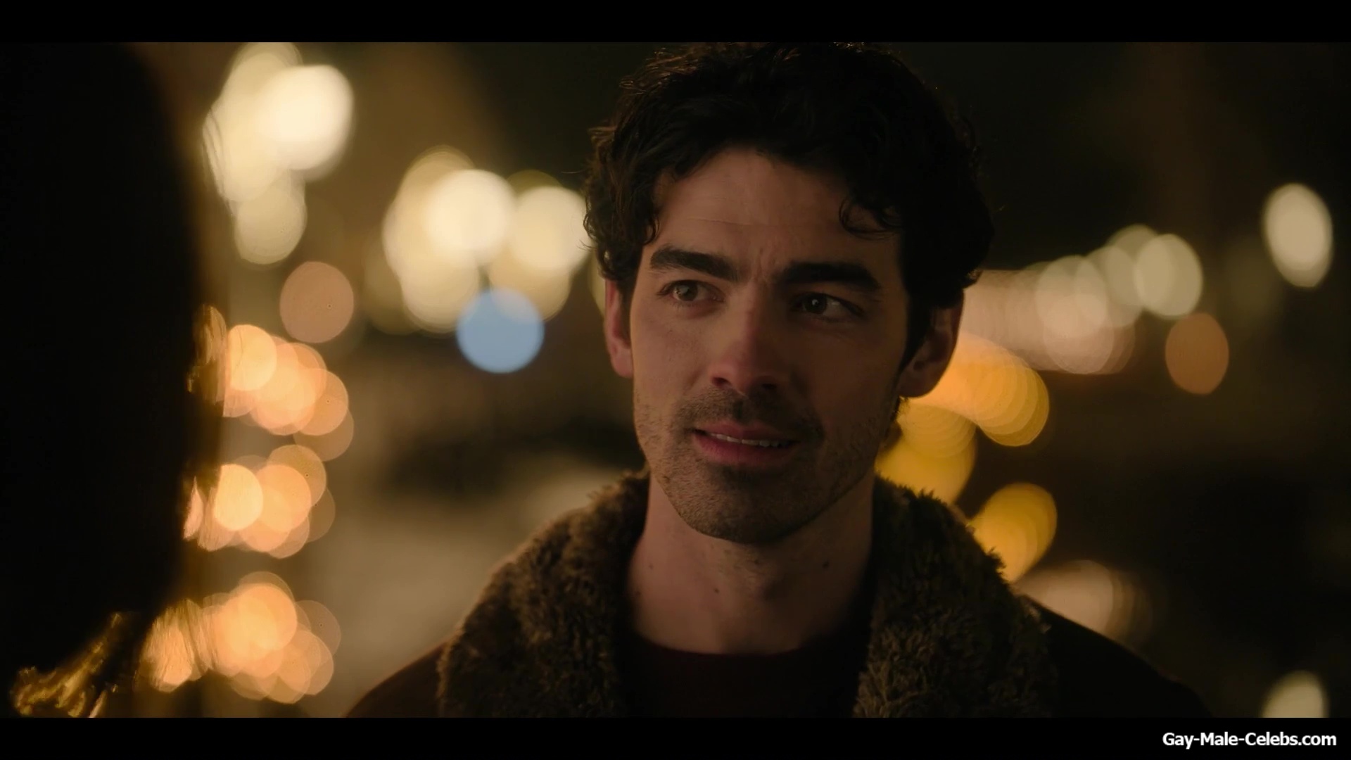 Joe Jonas shirtless in A Very Jonas Christmas Movie