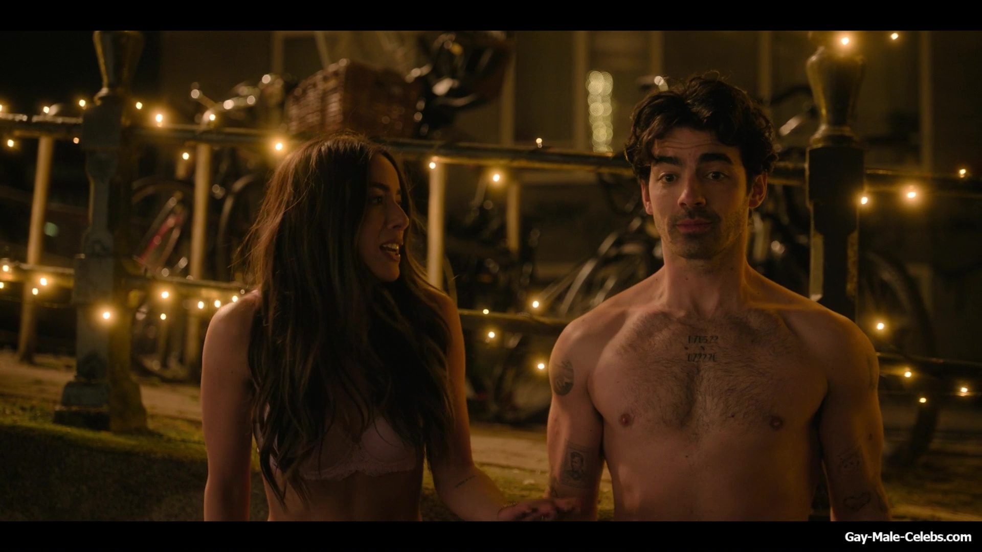 Joe Jonas shirtless in A Very Jonas Christmas Movie