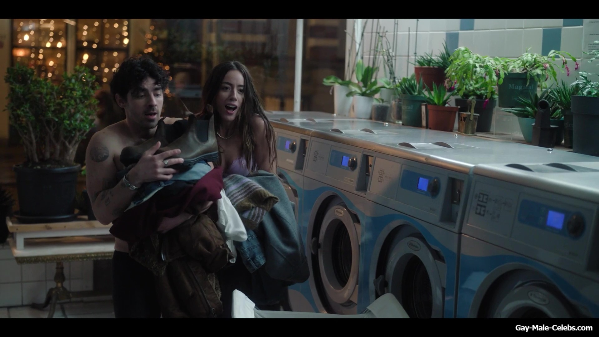 Joe Jonas shirtless in A Very Jonas Christmas Movie