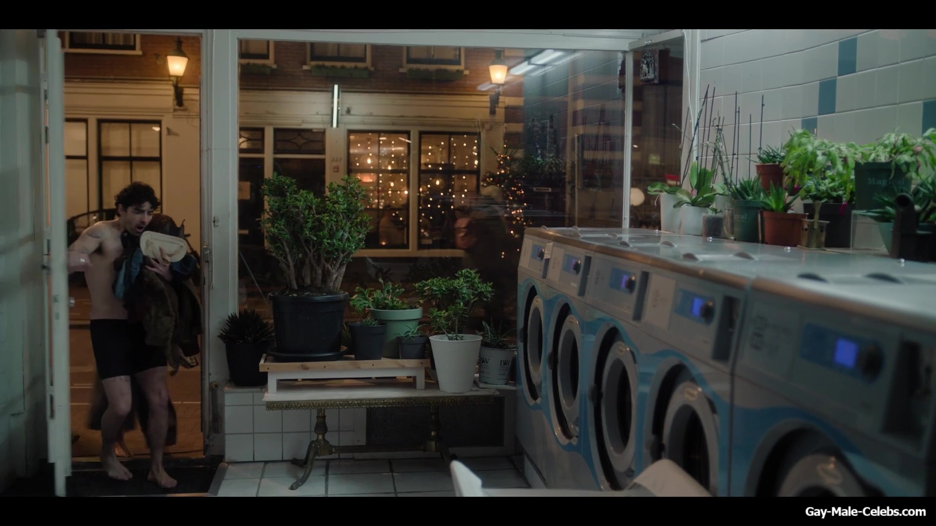 Joe Jonas shirtless in A Very Jonas Christmas Movie