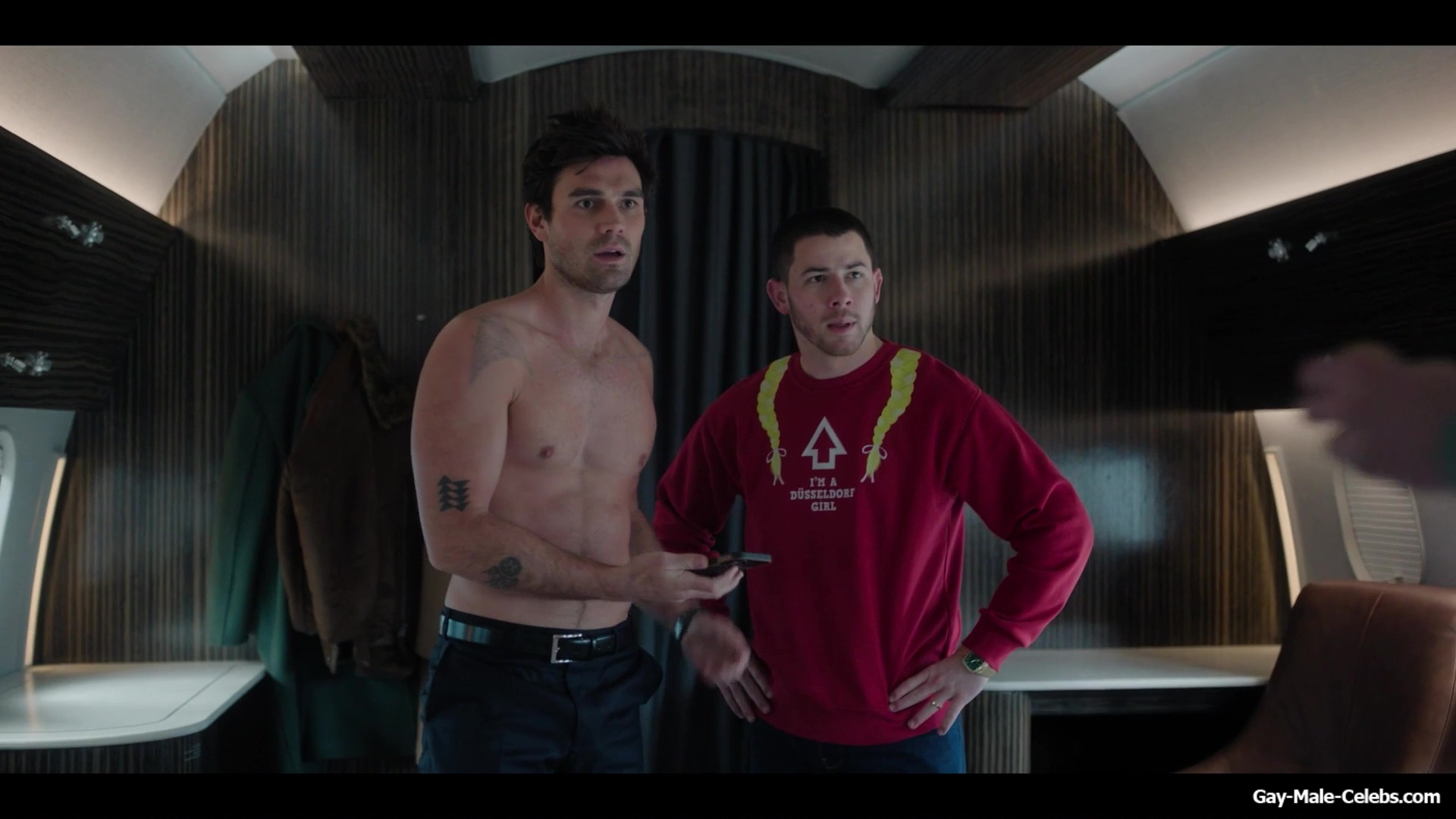 KJ Apa shirtless in A Very Jonas Christmas Movie