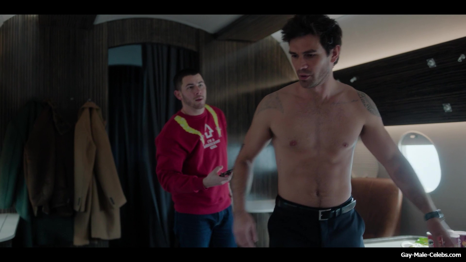 KJ Apa shirtless in A Very Jonas Christmas Movie