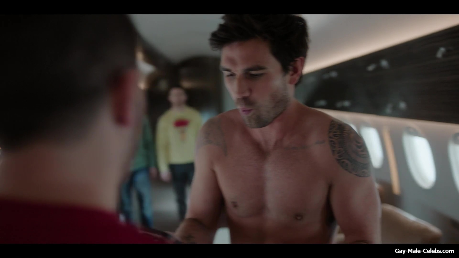 KJ Apa shirtless in A Very Jonas Christmas Movie