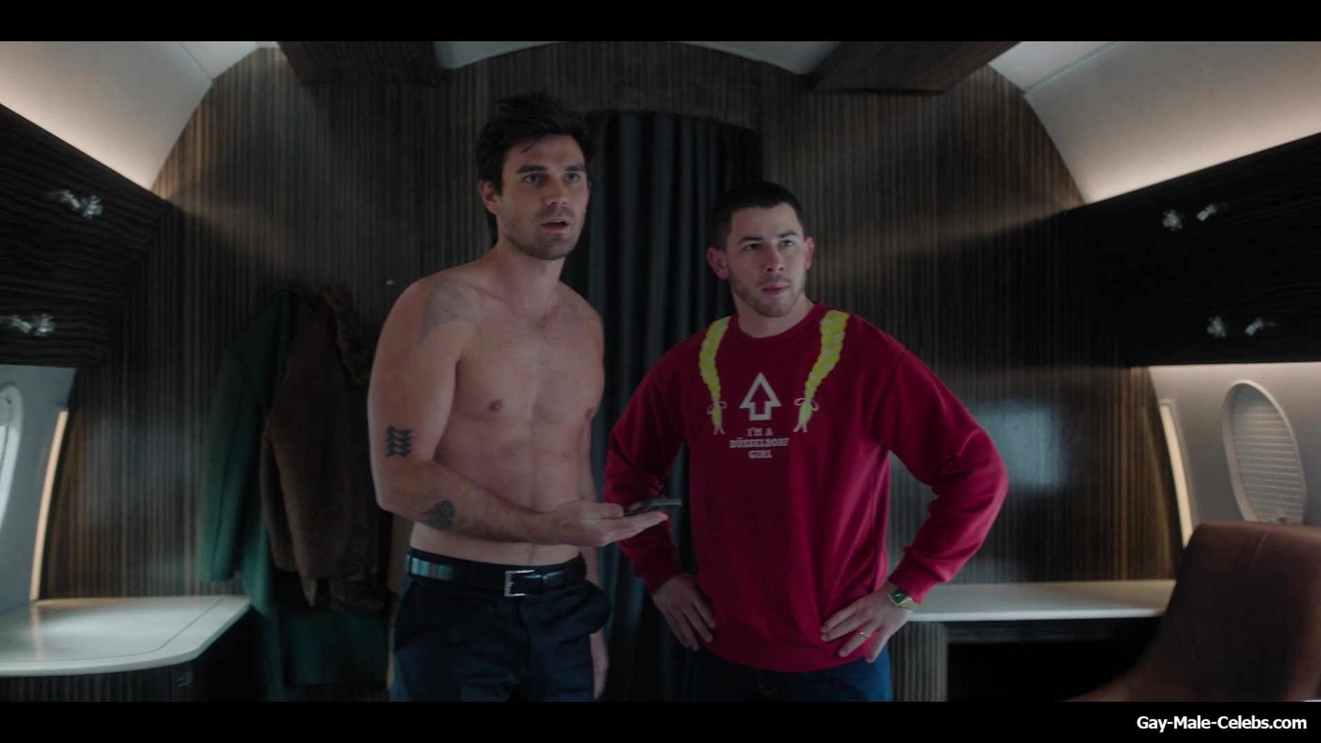 KJ Apa shirtless in A Very Jonas Christmas Movie