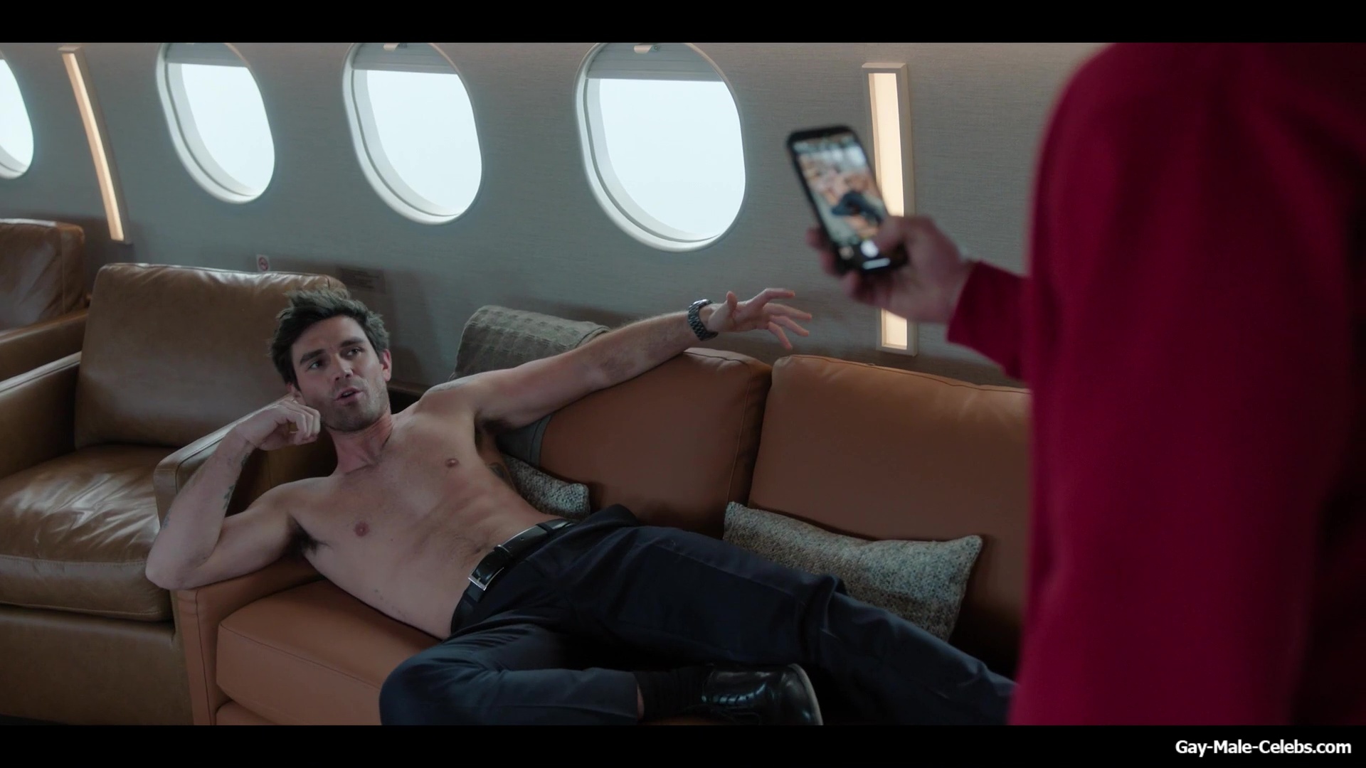 KJ Apa shirtless in A Very Jonas Christmas Movie