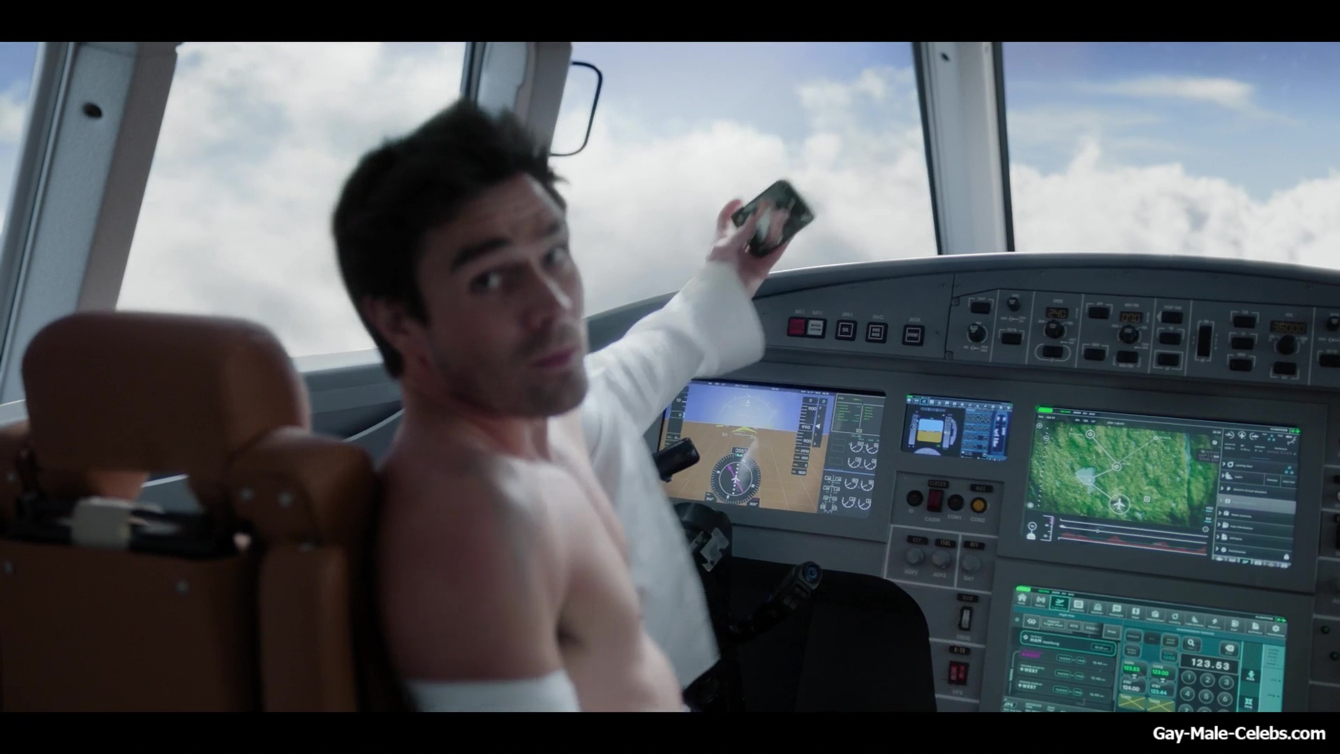 KJ Apa shirtless in A Very Jonas Christmas Movie