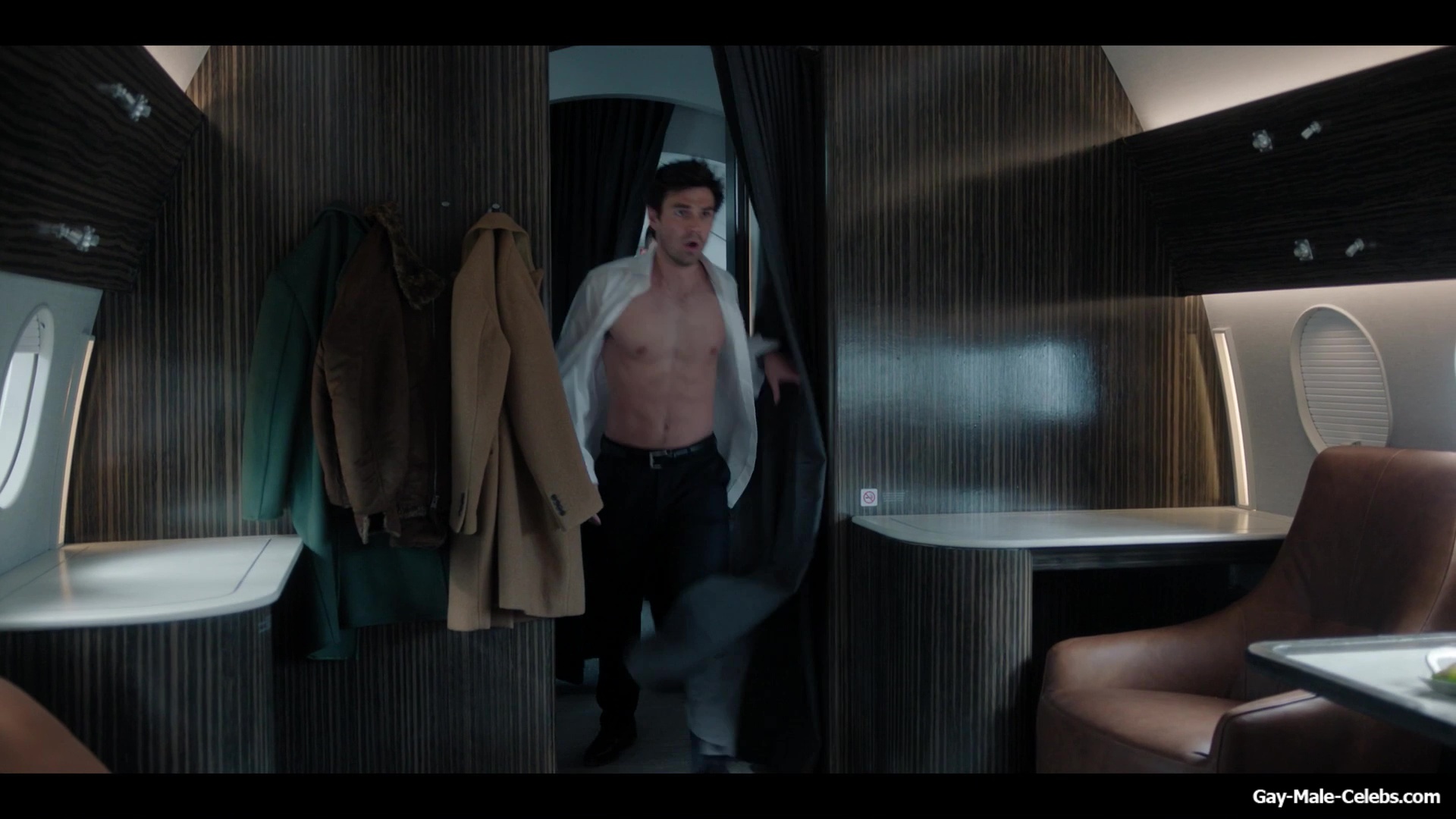 KJ Apa shirtless in A Very Jonas Christmas Movie