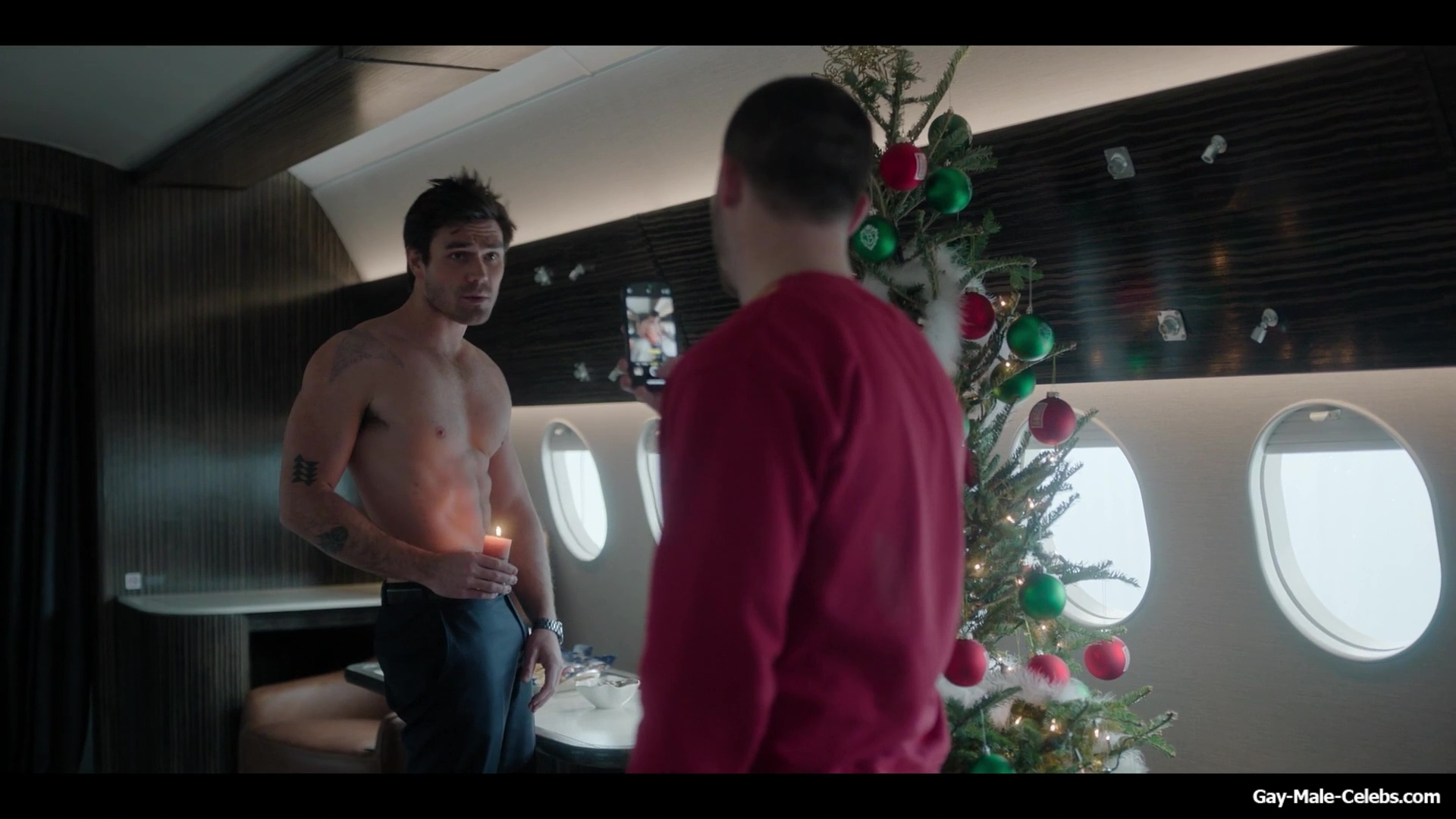 KJ Apa shirtless in A Very Jonas Christmas Movie