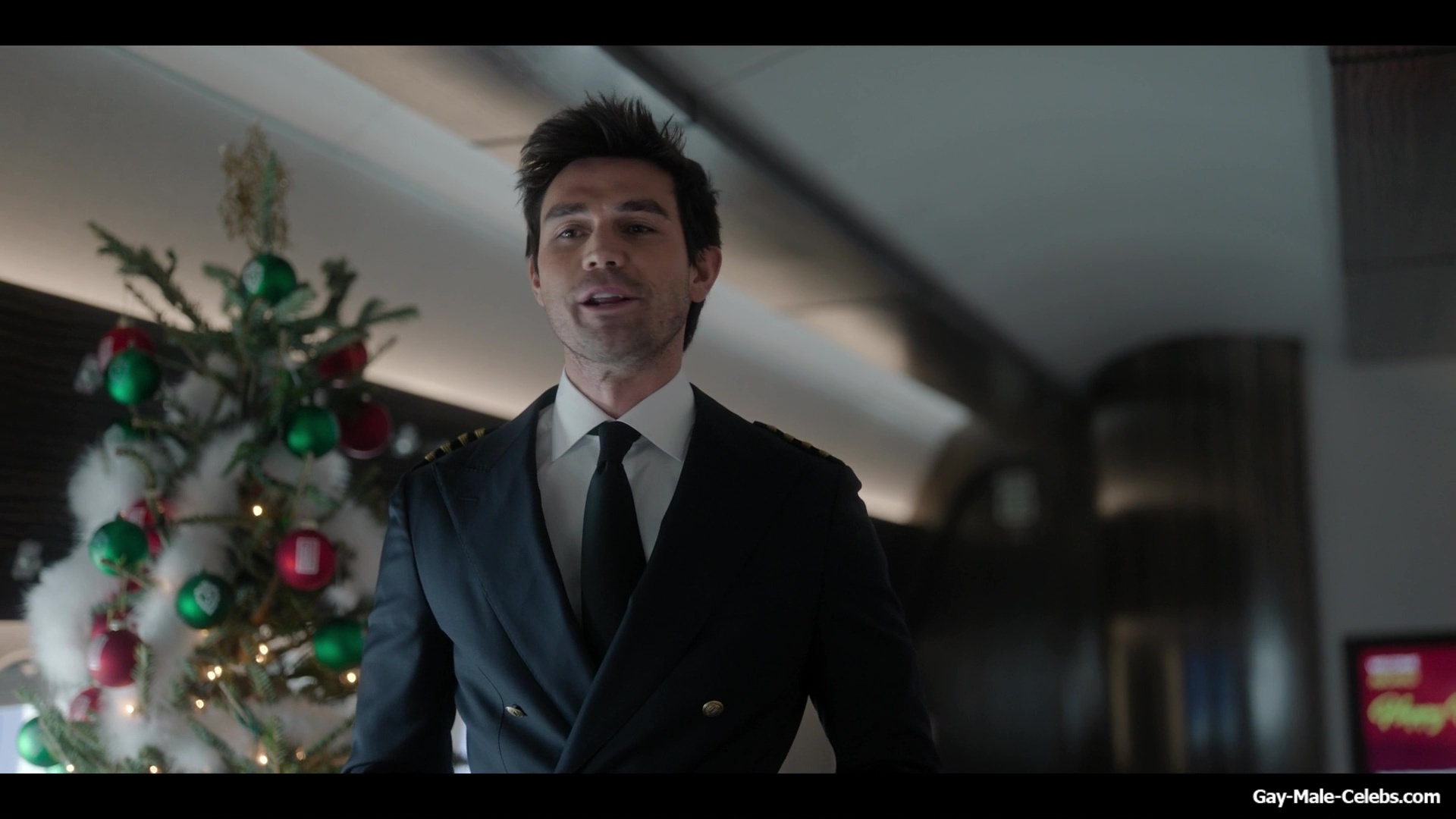 KJ Apa shirtless in A Very Jonas Christmas Movie