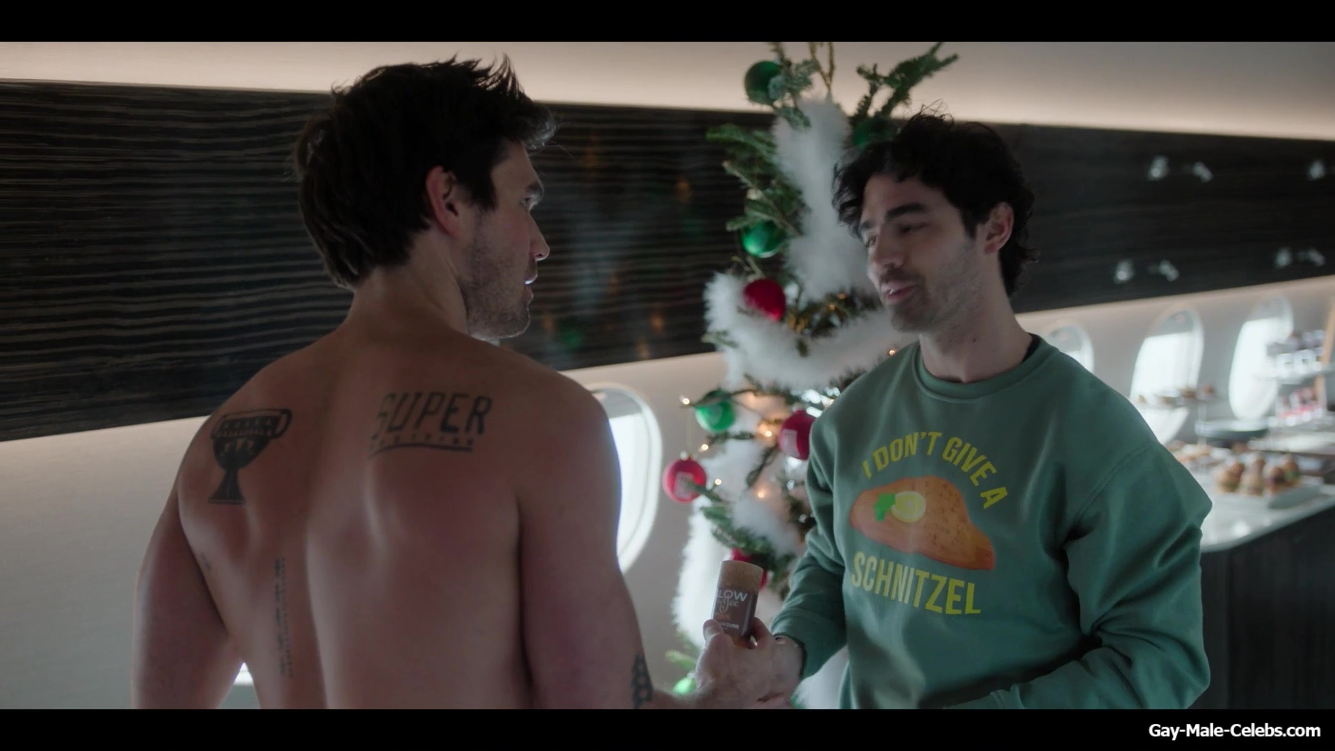 KJ Apa shirtless in A Very Jonas Christmas Movie