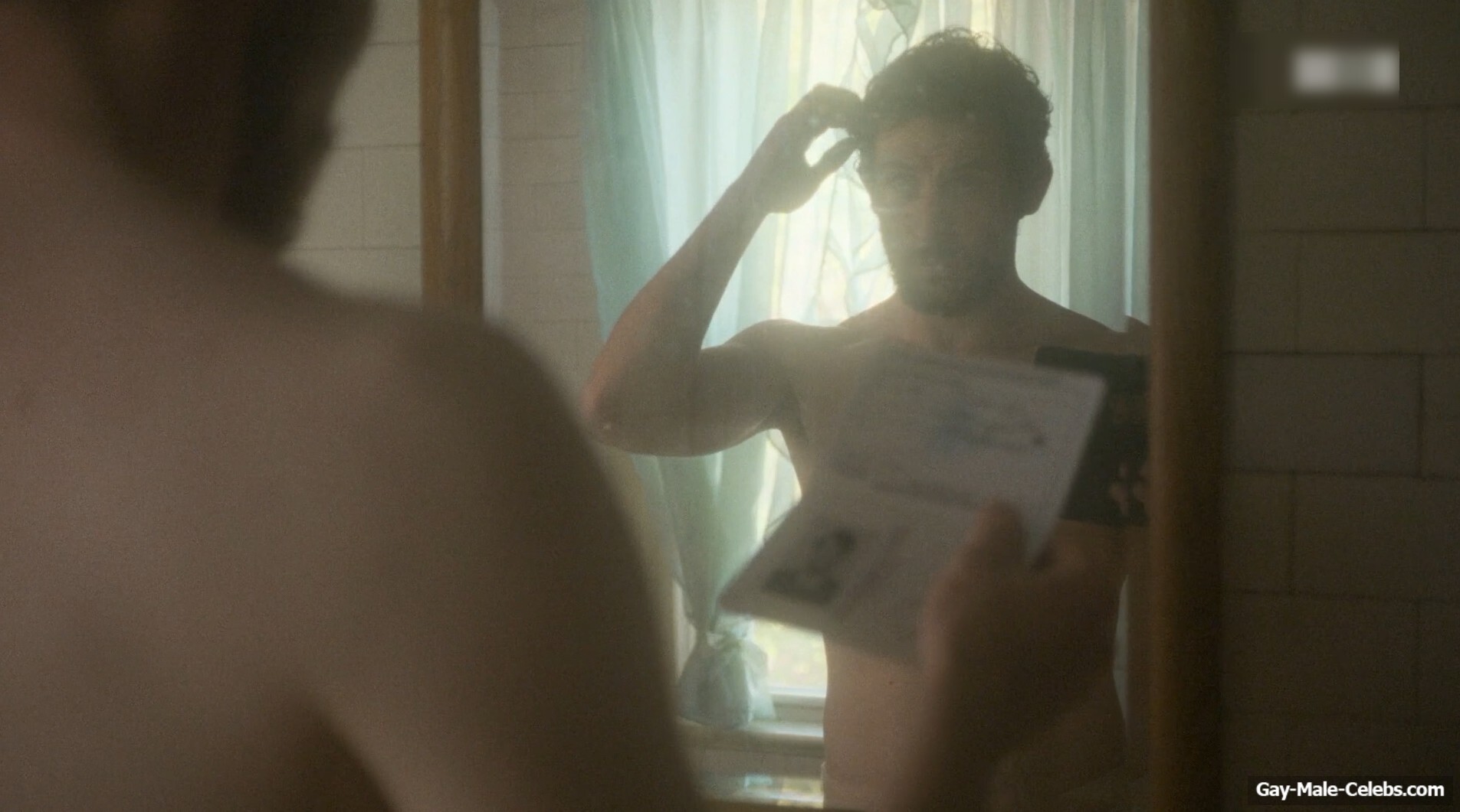 Josh O'Connor shirtless in The Mastermind
