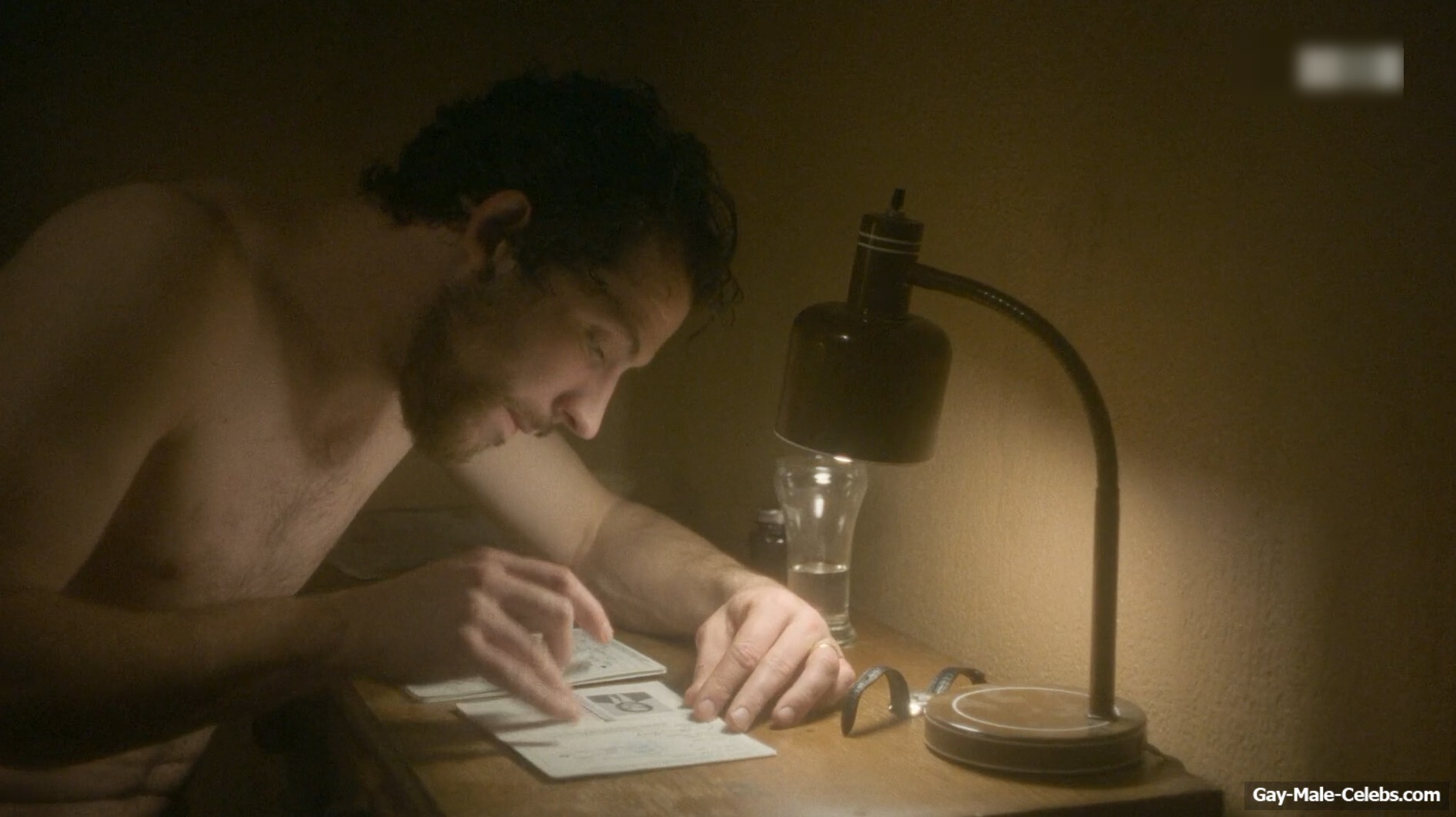 Josh O'Connor shirtless in The Mastermind