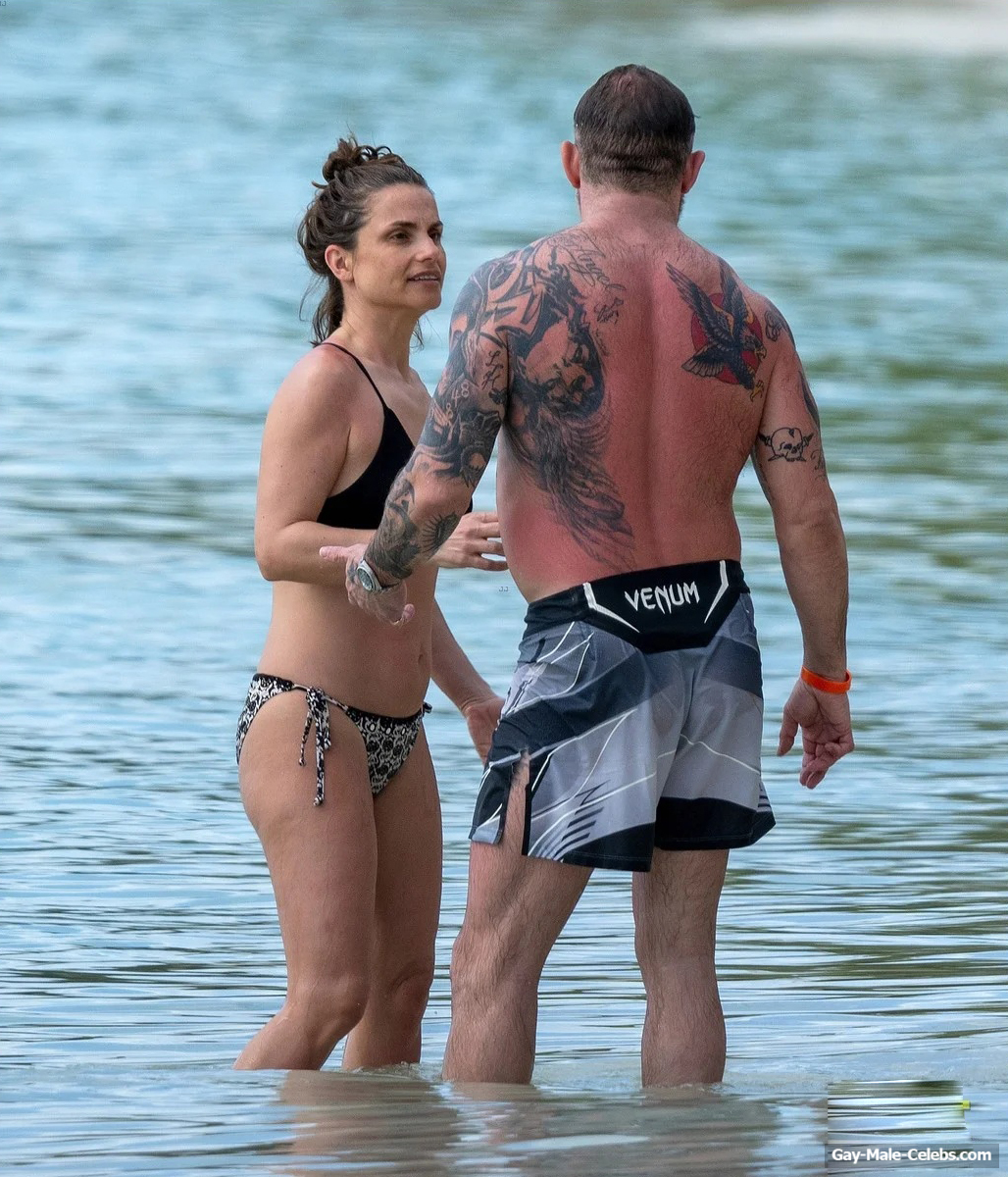 Tom Hardy shirtless on a beach