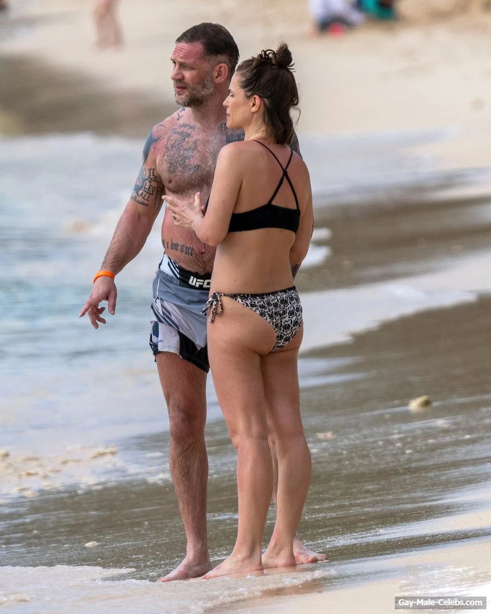 Tom Hardy shirtless on a beach