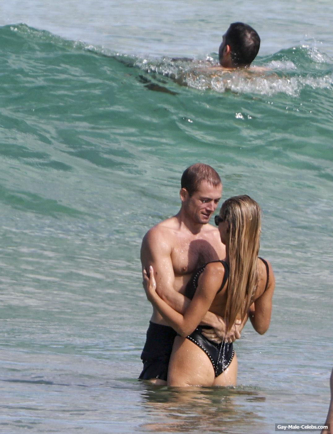 Taron Egerton shirtless beach pics