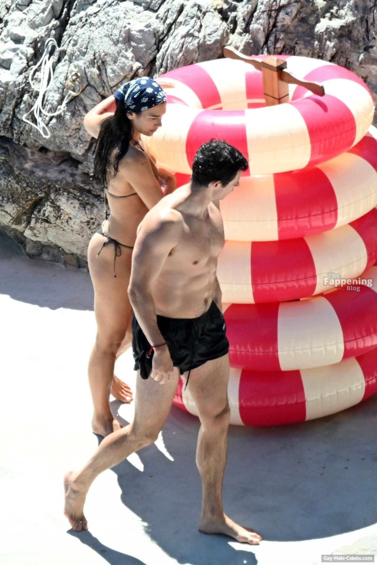 Callum Turner shirtless beach pics
