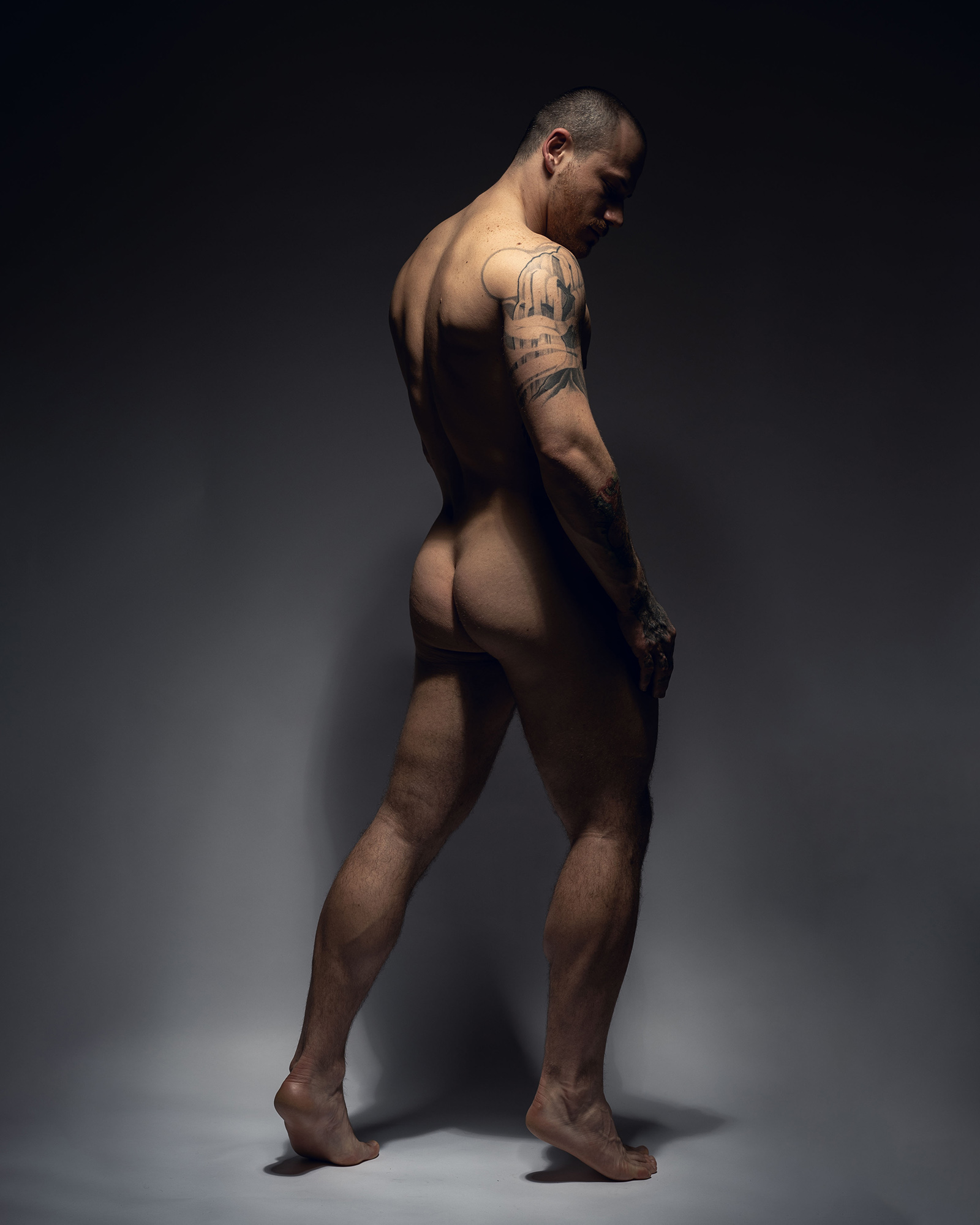 Cody, the handsome tattooed male — raw, sexy, untamable