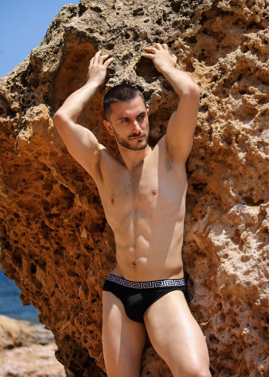Greek Heat: Anonymous Model Between Rocks and Turquoise Sea