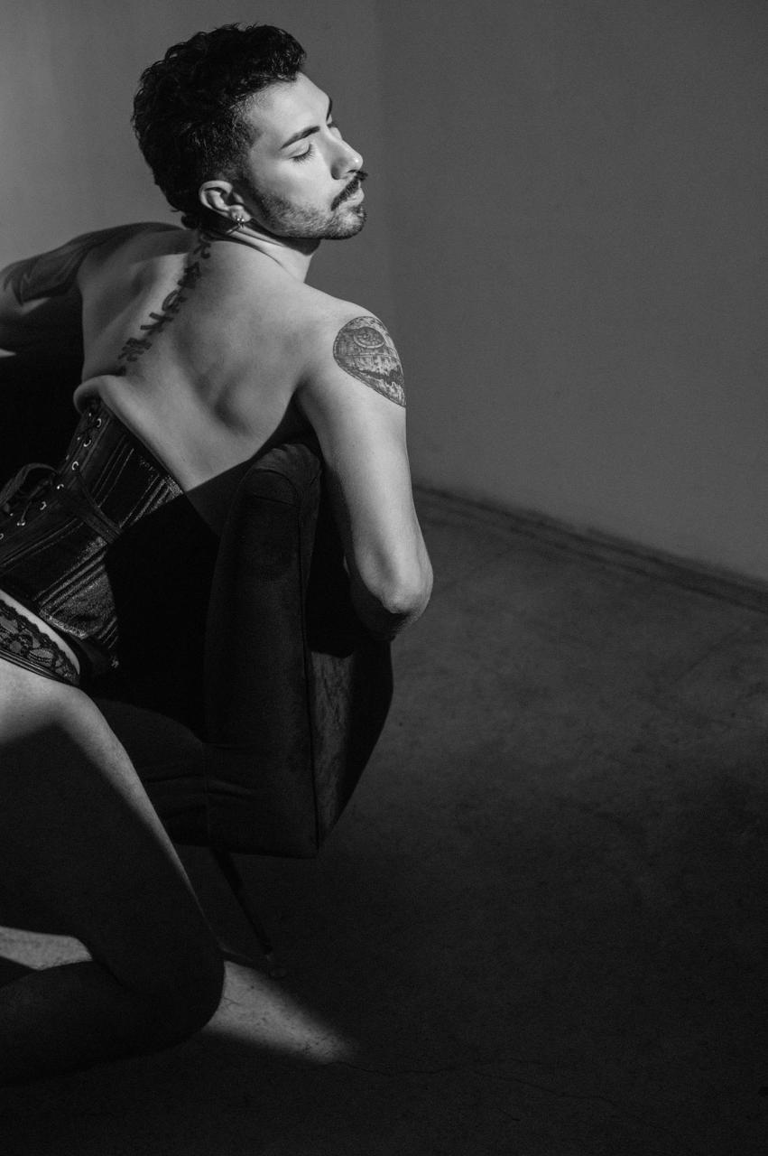 Jagger Zaas, brunette in black corset