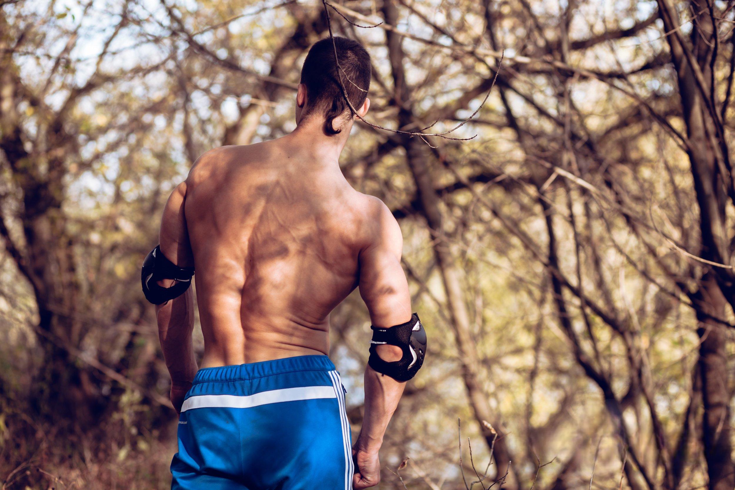 Man on Rollerblades Posing Nude