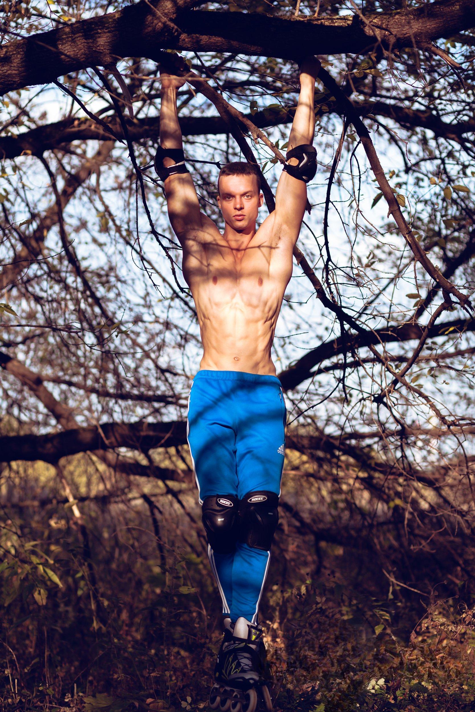 Man on Rollerblades Posing Nude