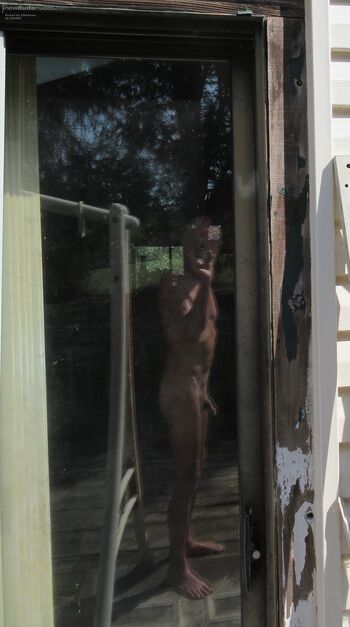 "Reflection with Light-&-Shadows" Artistic Nude photo #3. First was frontal, 2nd a 45-degree sideview, here's a 90-degree sideview. Outdoors, reflected in backyard door-glass. Light/dark NOT tweaked. Thermal doublepane glass caused slight double image.