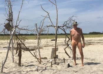 At my favorite nude beach this weekend, November 2 yes there is some shrinkage going on. Just like a perfect summer day, 79° with a light wind. Met up with some old friends and found this piece of art to take a picture with.