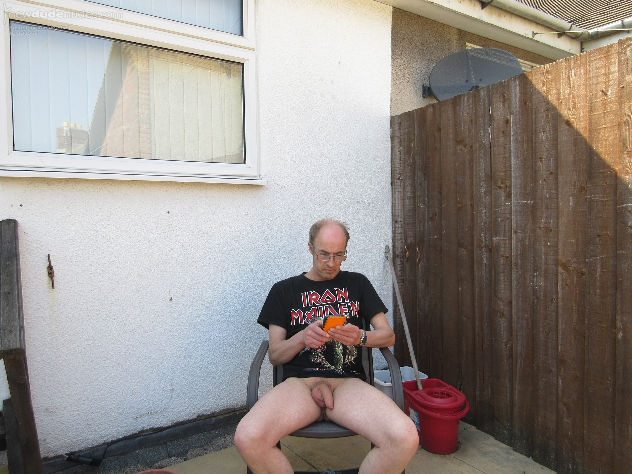 Chris showing off his cock on his balcony
