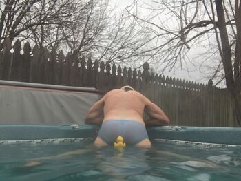Enjoying the hot tub on a chilly day - rubber ducky looking at my ass