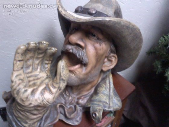 I like this funny bottle holder. I looks like the cowboy is sucking a HUGE cock - Brokeback Mtn style!