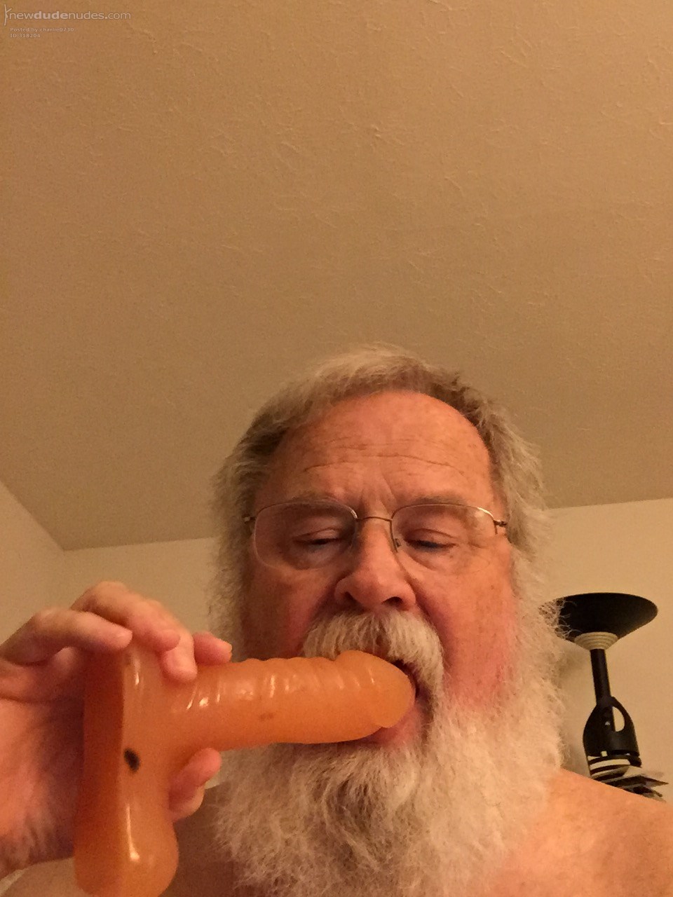 Sucking a dildo